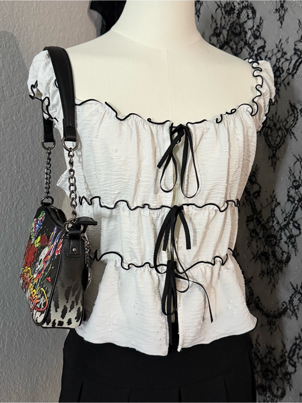 White Ruffle Tie-Front Blouse with Black Contrast Trim